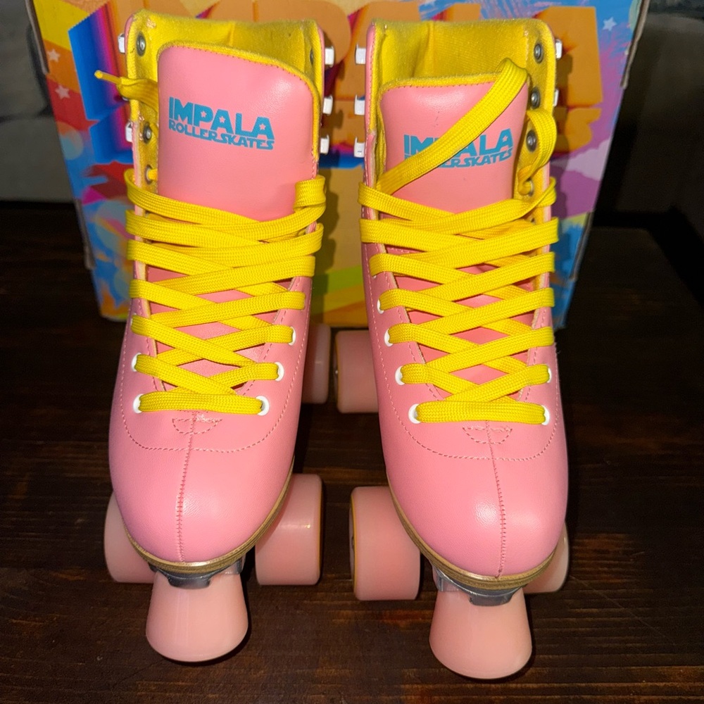 Pink and Yellow Athletic Shoes with Branding